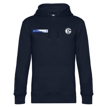 Dunkelblauer Kapuzenpullover mit Kängurutasche und Kapuze mit Kordelzug. Auf der linken Brust ist ein rundes Vereinslogo mit der Aufschrift ‚S04‘ angebracht, rechts daneben ein rechteckiger Patch mit Schriftzug